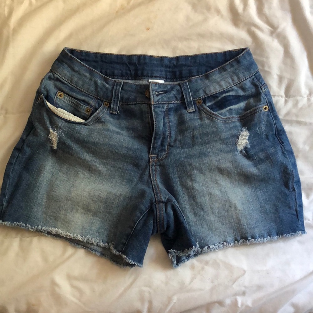 Distressed denim shorts